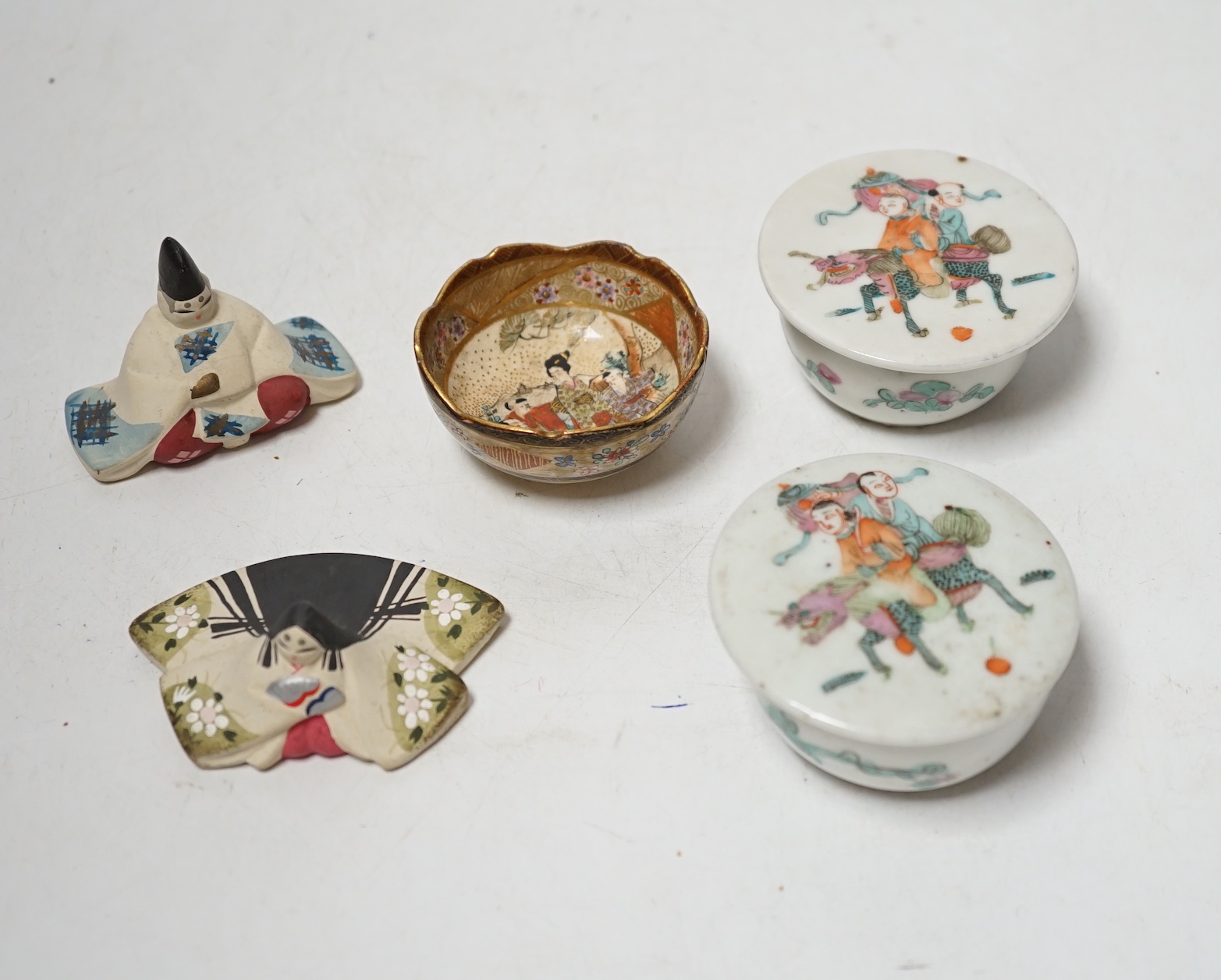 A pair of late 19th century Chinese famille rose jars and covers, Satsuma small bowl and two pottery models, 7cm wide